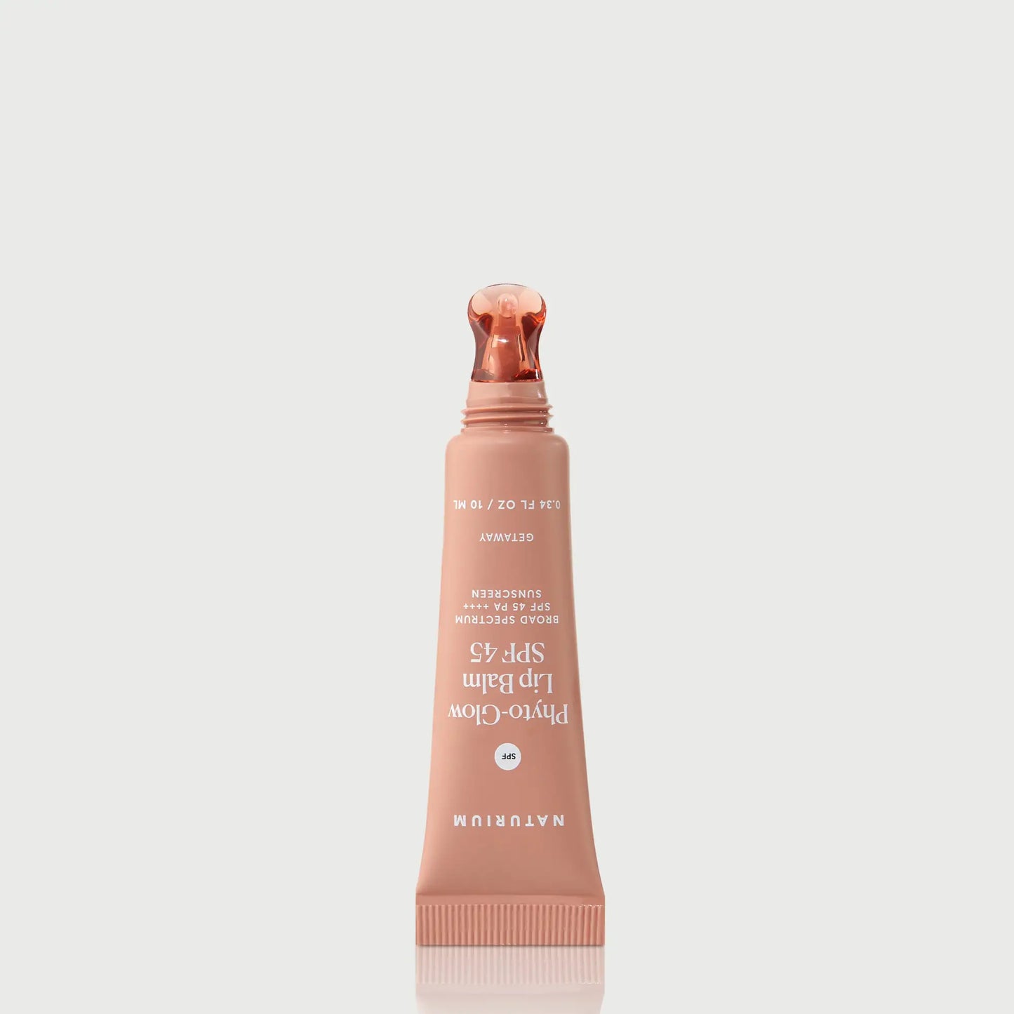 phyto-glow-lip-balm-spf-45-getaway-e4 NATR-10126_PhytoGlow_SPF_Getaway_primary_nocap_bonebkgd_1.webp