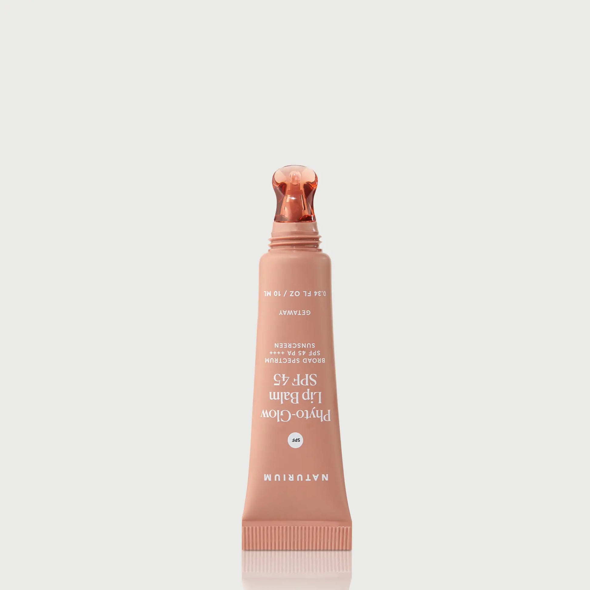phyto-glow-lip-balm-spf-45-getaway-e4 NATR-10126_PhytoGlow_SPF_Getaway_primary_nocap_bonebkgd_1.webp