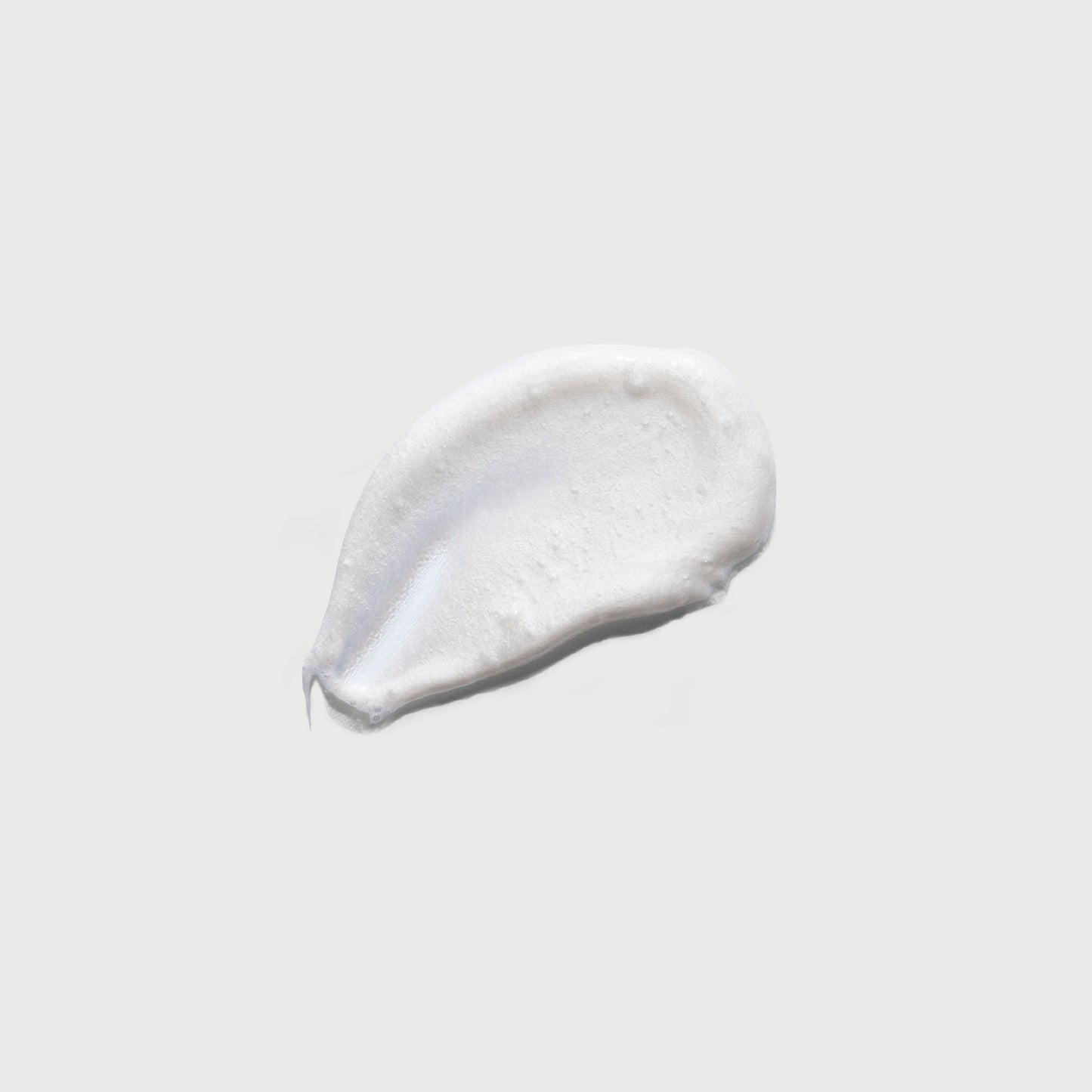 the-smoother-glycolic-acid-exfoliating-body-wash-u2 NATR-40002-Swatch-The-Smoother-Glycolic-Acid-Exfoliating-Body-Wash-bonebkgd.jpg