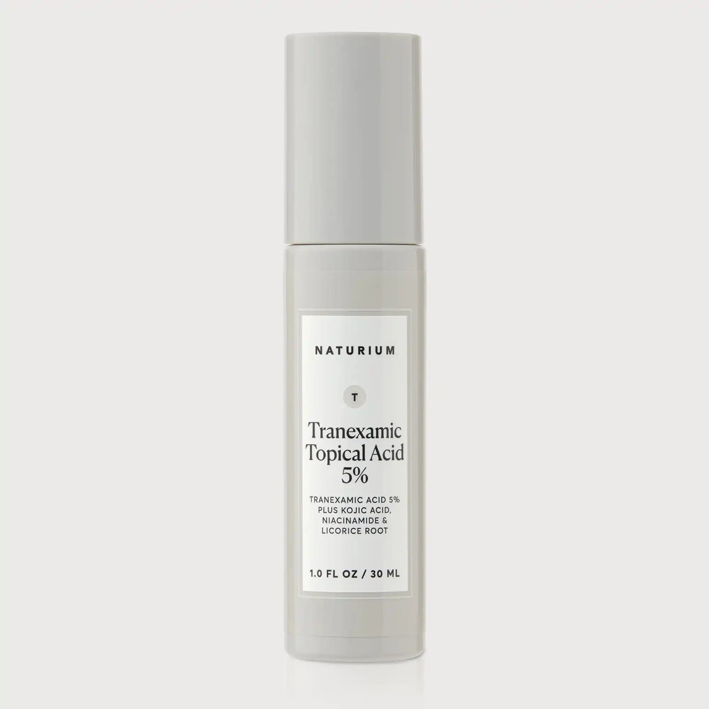 tranexamic-topical-acid-5-x5 Naturium_Tranexamic_Acid_Front_CapOn_Bone_1.webp